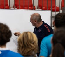 Guy delivering instructions to the youth players